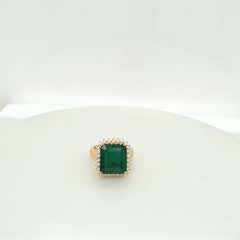 7 carat Brazilian emerald ring in 14kt yellow gold with a halo of natural F-G VS1 diamonds, view 1