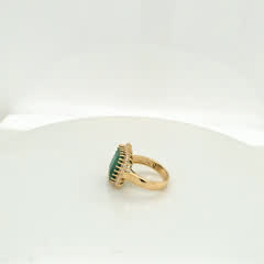 7 carat Brazilian emerald ring in 14kt yellow gold with a halo of natural F-G VS1 diamonds, view 2