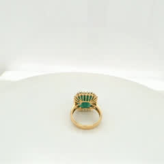 7 carat Brazilian emerald ring in 14kt yellow gold with a halo of natural F-G VS1 diamonds, view 3
