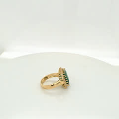 7 carat Brazilian emerald ring in 14kt yellow gold with a halo of natural F-G VS1 diamonds, view 4