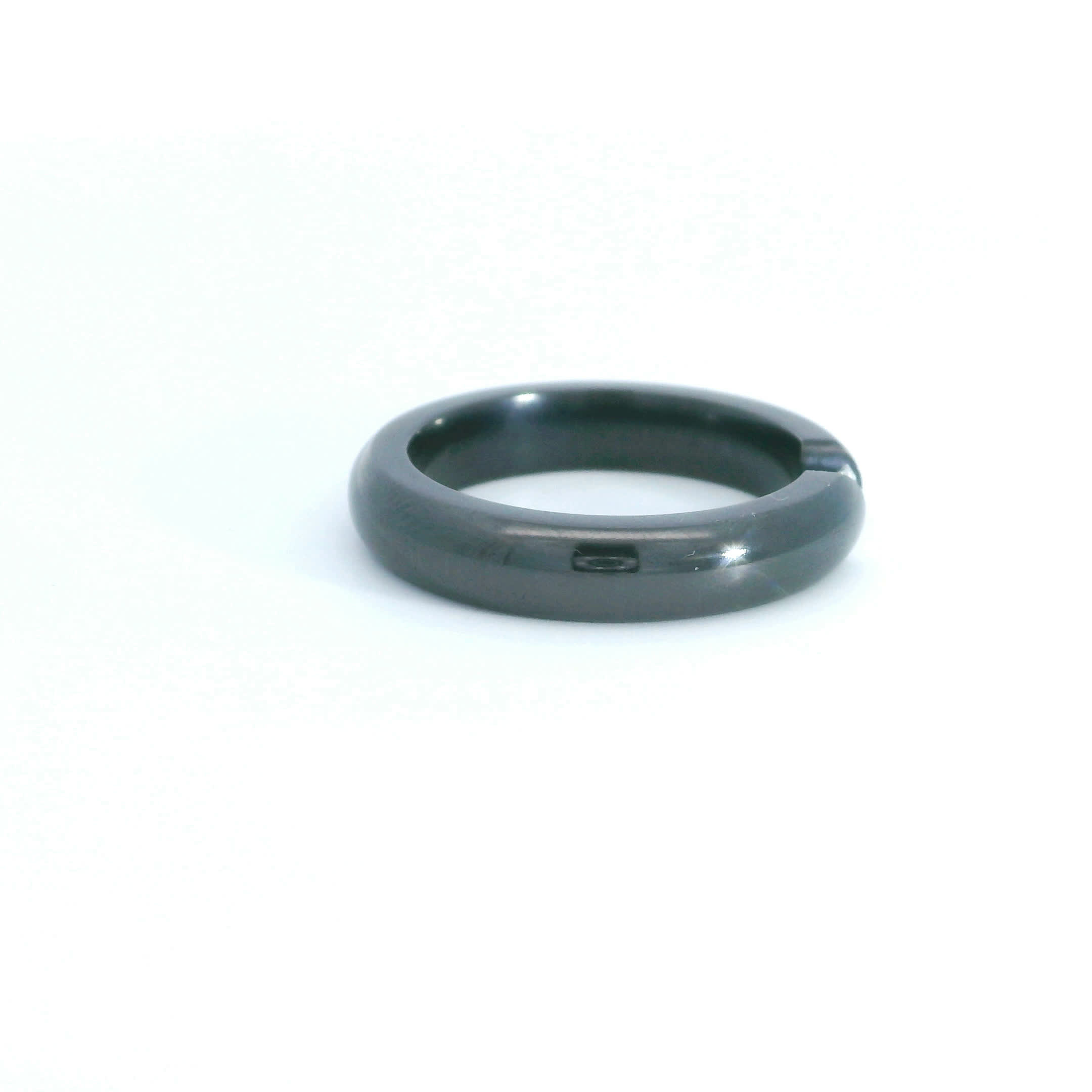 Minimalist Tension-Set Diamond Solitaire Ring in Black TITANIUM
