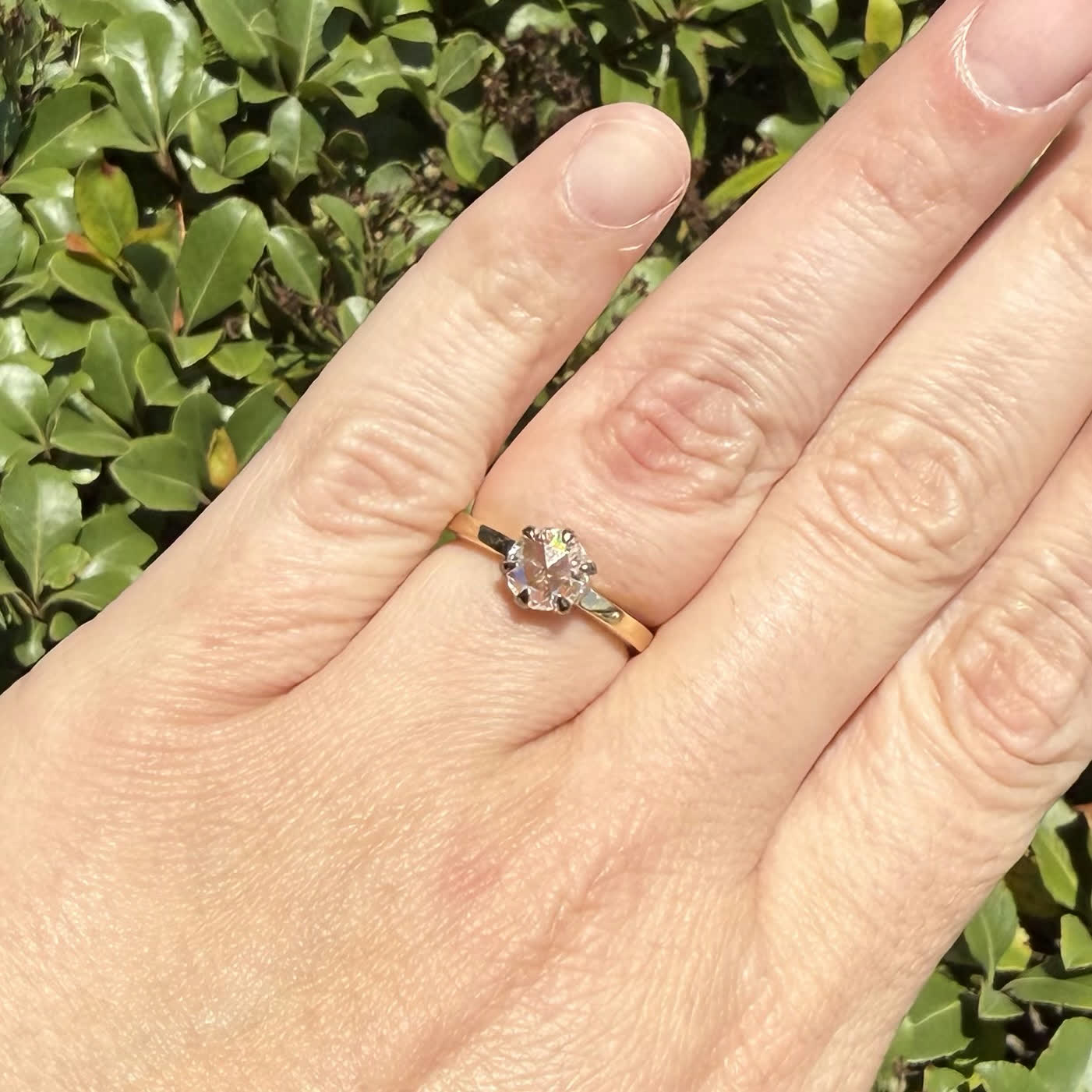 Gold Solitaire Ring with Round Brilliant Moissanite